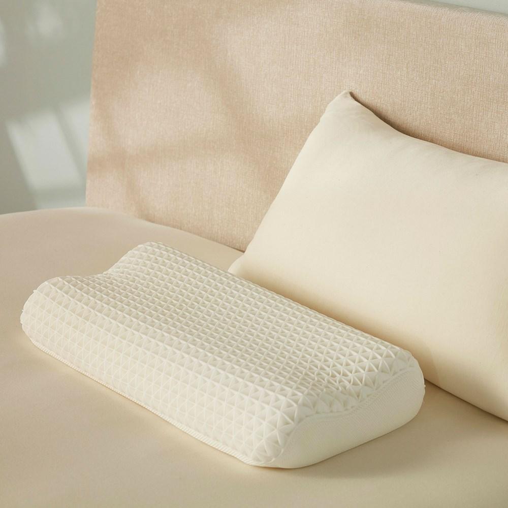 Brace Contour Pillow. From $249.00. Available at George Street Linen